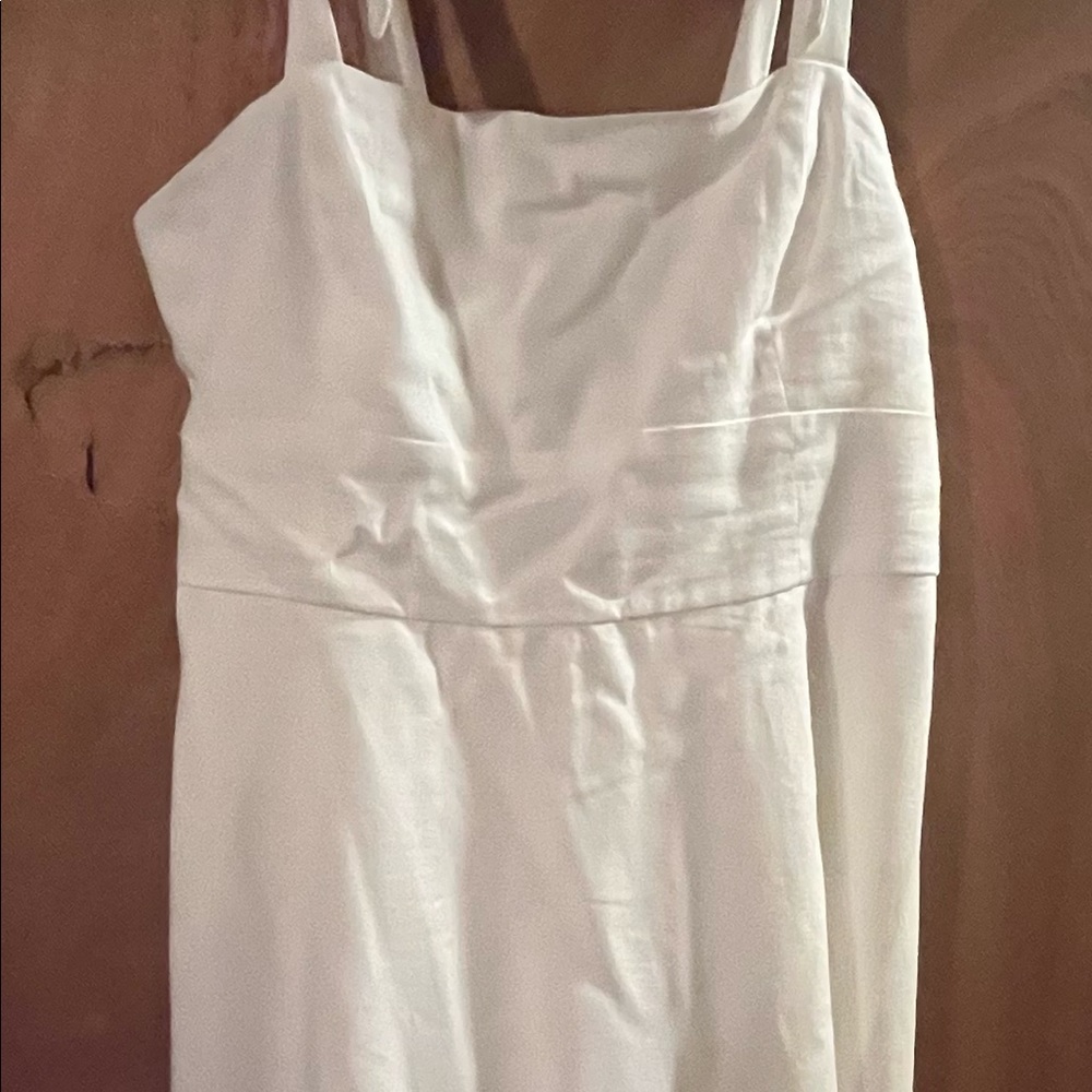 Dillard’s cute white summer dress with straps tied on the shoulders knee length